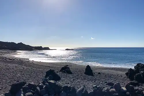 Playa de Echentive with volcanic gravel and natural sea pools on La Palma